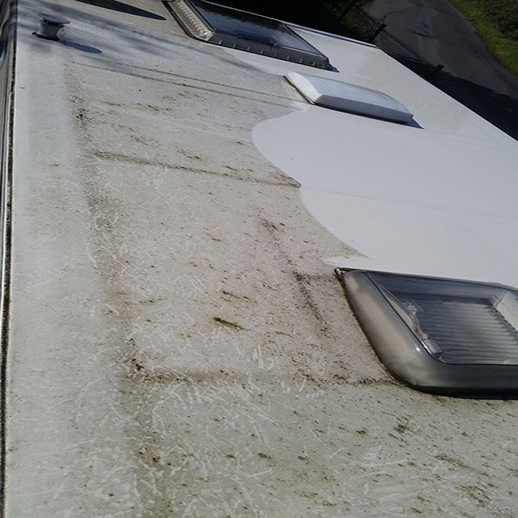 caravan roof being cleaned